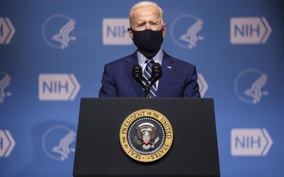 President Joe Biden talks to staff at the National Institutes of Health on Thursday, February 11, 2021 in Bethesda, Maryland. Biden is on his way to the G-7 Summit starting Sunday, June 26, 2022, where negotiators are already mulling over a cap on Russian oil prices. 