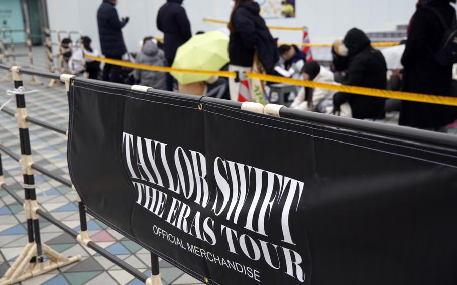 Taylor Swift fans line up outside Tokyo Dome to buy the pop star's official merchandise, Monday, Feb. 5, 2024.