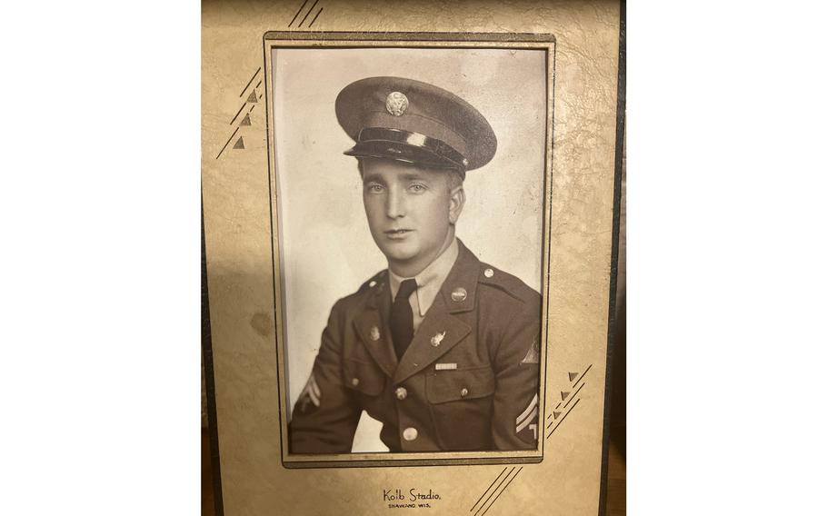 A picture of a framed black and white portrait.