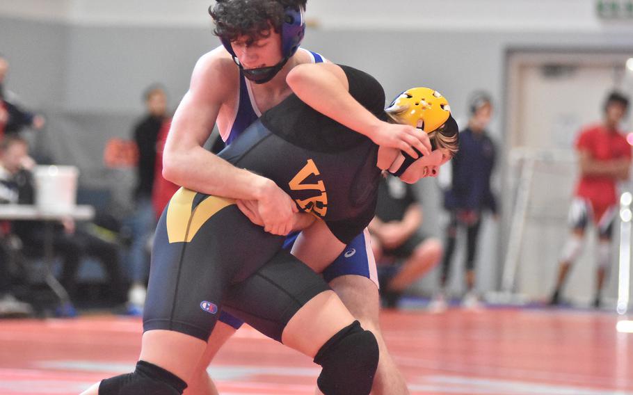 Rota's James Troxel has Vicenza's Larkin Blue in his grasp in a 132-pound match Saturday, Feb. 4, 2023, at the DODEA-Europe Southern Europe regional at Aviano Air Base, Italy. Troxel won the match.