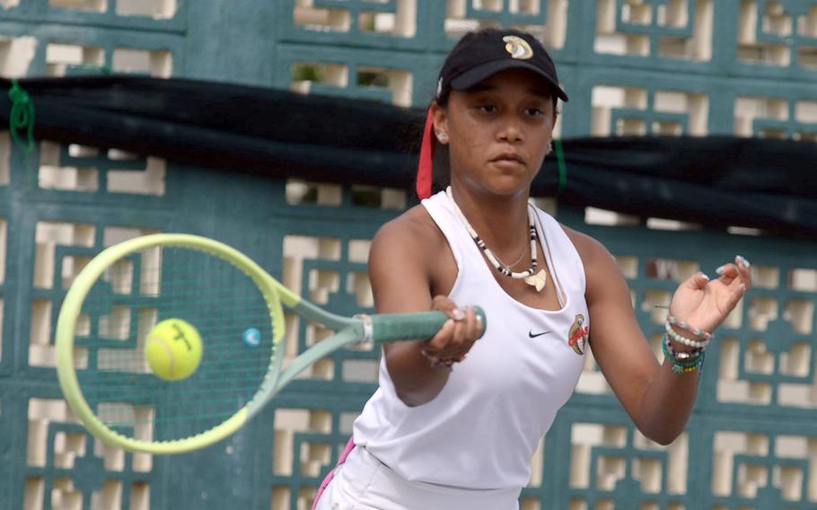 E.J. King's Miu Best hits a forehand return during her 6-1, 6-4 Far East tournament girls singles final loss to her twin sister Moa.