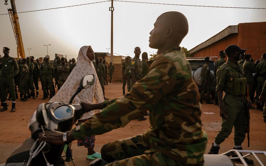 The National Police and the military forces are seen at Rond-Point de l’Escadrille, near the military base in Niamey. The area has been a gathering place for pro-coup protesters.