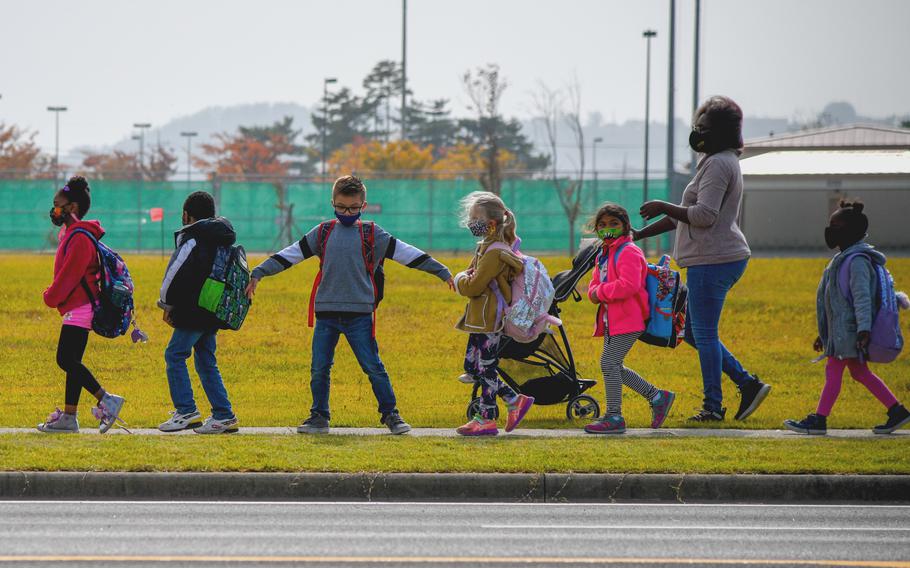  Schoolchildren at Camp Humphreys, South Korea, line up for the base homecoming parade Oct. 22, 2021. USFK plans to start vaccinating children against COVID-19 this week with the Pfizer vaccine.