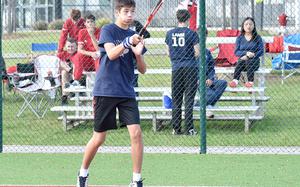 Ansbach's Jack Lovallo hits a ball during a singles match against Vilseck's Steven Harker on Sept. 23, 2023, at Kaiserslautern High School in Kaiserslautern, Germany.