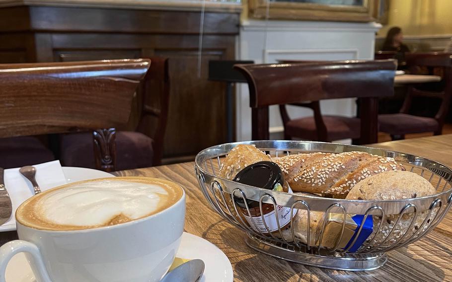 A cappuccino with bread rolls and some spreads at The Victorian House on July 2, 2021 in Munich, Germany. 