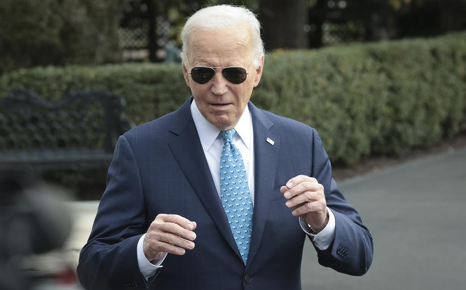 Joe Biden answers questions while departing the White House on Jan. 30, 2024.