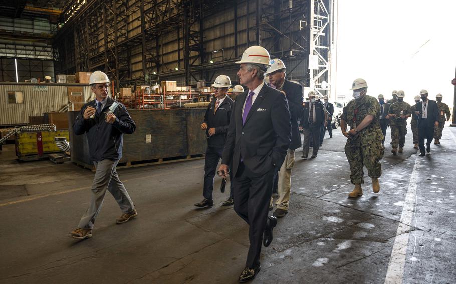 Then-Secretary of the Navy Kenneth J. Braithwaite, right, tours General Dynamics Electric Boat in Groton, Conn on July 8, 2020. Braithwaite visited five shipyard locations to view current work, tour facilities, and meet with shipbuilders​ to discuss industrial base economic wellness and workforce health, ensuring all are able to support Navy priorities for Sailors and Marines.