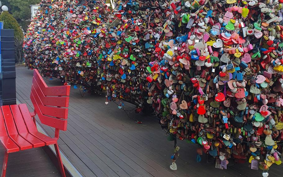Colorful Love Locks decorate trees near the Bridge of Love at Namsan Seoul Tower, March 7, 2023.