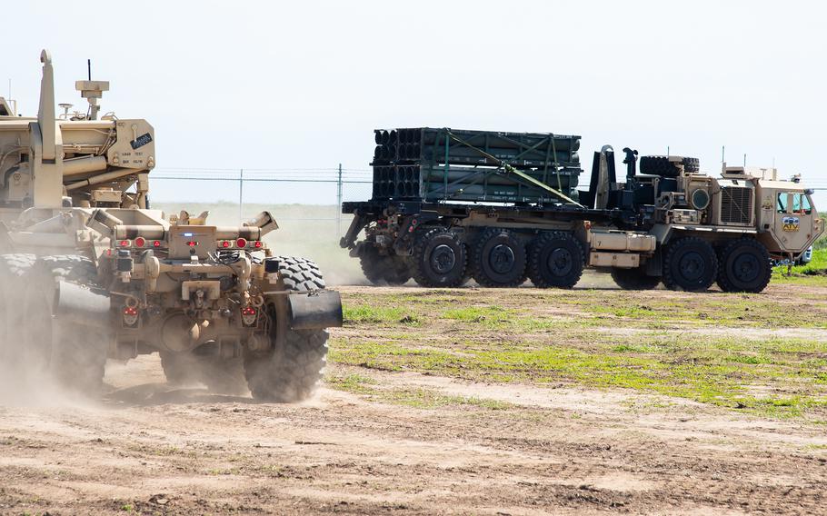 Self-driving tactical vehicles move themselves during a demonstration of emerging technologies on March 5, 2024, during Project Convergence at Camp Pendleton, Calif. 