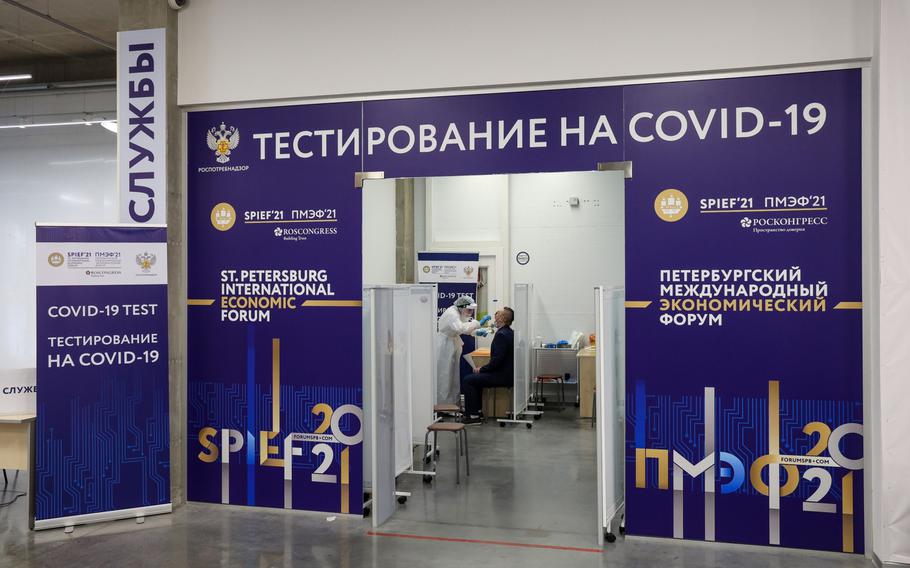 A medical worker administers a Covid-19 swab test to an attendee at a St. Petersburg International Economic Forum (SPIEF) testing point close to the airport in St. Petersburg, Russia, on June 2, 2021. 