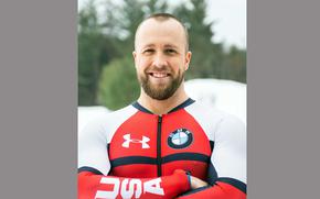 Jimmy Reed, who grew up in the U.S. military community in Garmisch, Germany, will compete in bobsled for Team USA at next month’s Winter Olympics in Beijing.