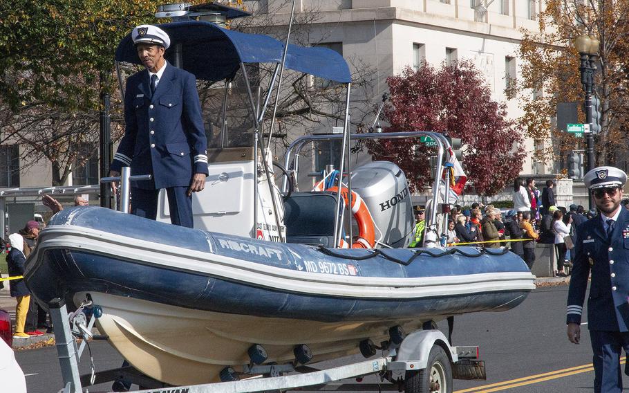 The Coast Guard Auxiliary takes part in the National Veterans Day Parade on Sunday, Nov. 12, 2023, in Washington. 