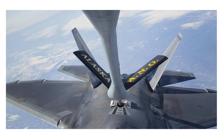 An F-22 Raptor fighter jet hooks up to an Alaska Air National Guard KC-135 Stratotanker, from the 168th Air Refueling Wing, to conduct in-air refueling over the Joint Pacific Alaska Range Complex during their fighter/bomber exercises, May 1, 2014. Personnel changes implemented at the national level may hinder the Alaska Air National Guard’s ability to refuel U.S. and Canadian fighter jets when they scramble to escort Russian bombers nearing North American air space.