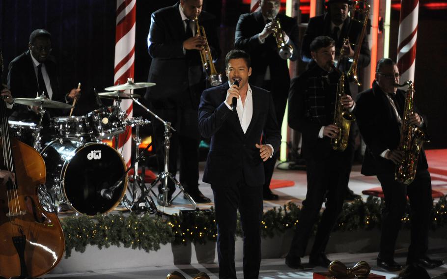 Harry Connick Jr. performs at the Christmas tree lighting at Rockefeller Center in Manhattan on Nov. 29, 2017, in New York. 