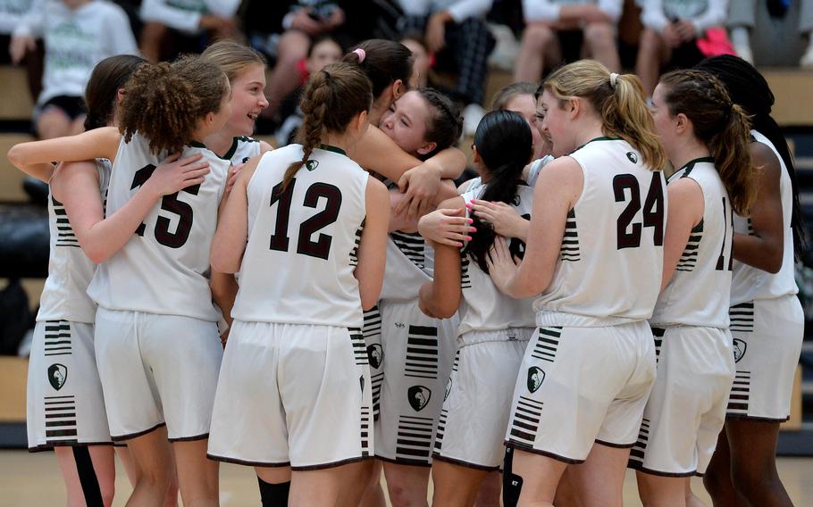 The AFNORTH Lions celebrate their 34-23 win over Ansbach in the girls Division III final at the DODEA-Europe basketball championships in Wiesbaden, Germany, Feb. 17, 2024.