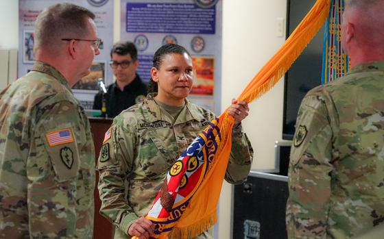 U.S. Army Colonel Tanta McGonegal receives the command flag during the change of command of Joint Task Force - Civil Support, Feb. 9, 2024.