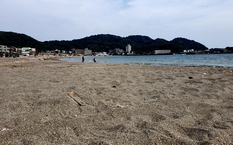 People enjoy Zushi Beach, not far from Yokosuka Naval Base, Japan, on Monday, June 26, 2023. 