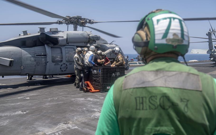 Sailors from the Dwight D. Eisenhower Carrier Strike Group render assistance to distressed mariners at sea in the Red Sea on Saturday, June 15, 2024. 