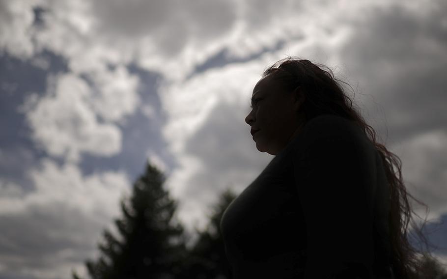 Hilda, who did not provide a last name, poses for a portrait at a park in Denver on April 13, 2023. 