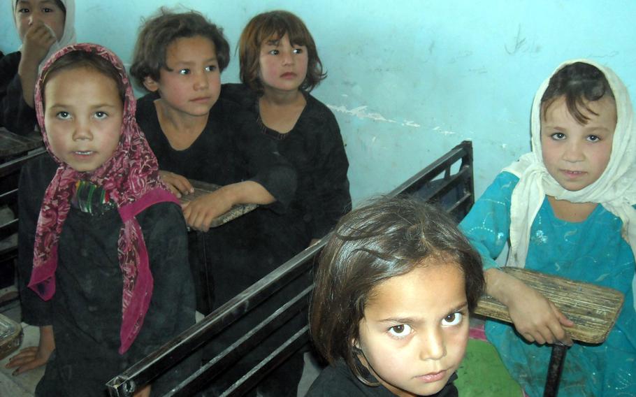 These students in a 2009 photo were part of the first generation of girls in a northern Afghanistan village to get an education at a school that opened in 2003.