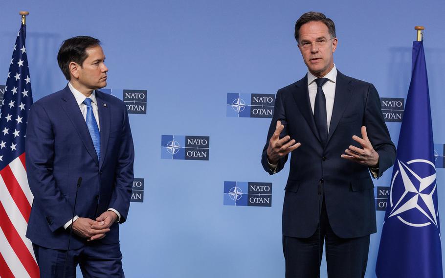 Marco Rubio listens to NATO Secretary-General Mark Rutte speak at NATO headquarters. 