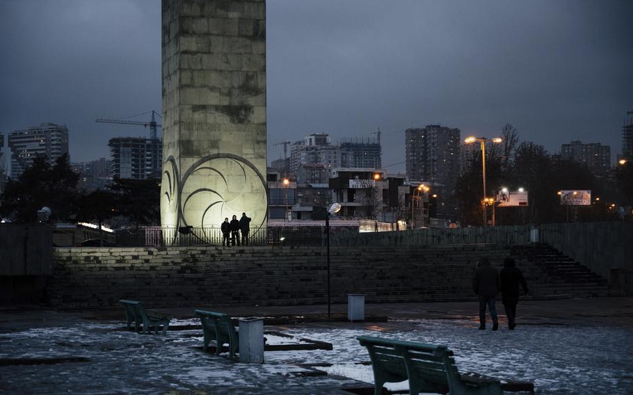 Young people in front of a monument of the Soviet era in Yerevan, Armenia, on Feb. 2.