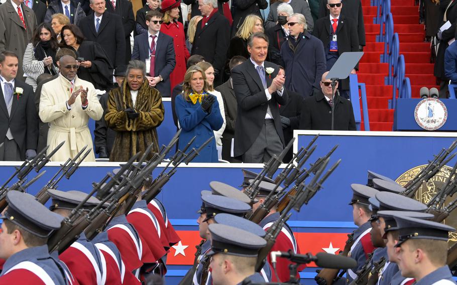 Gov. Glenn Youngkin watches the cadets of the Virginia Military Institute after being sworn in on the front steps of the Virginia Capitol on Jan. 15, 2022, in Richmond.