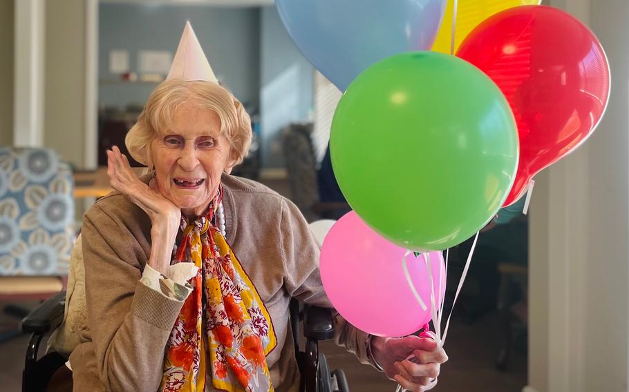 Mary Barnes celebrates her 103rd birthday at the Virginian assisted-living center in Fairfax, Va., on Sunday, Jan. 15, 2023.