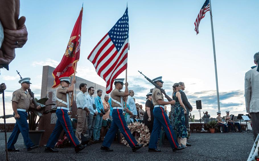 The Marine Corps Forces Pacific color guard marches during a ceremony.