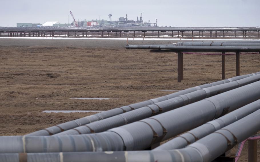 Oil pipelines stretch across the landscape outside Nuiqsut, Alaska, where ConocoPhillips operates the Alpine Field on May 28, 2019. 