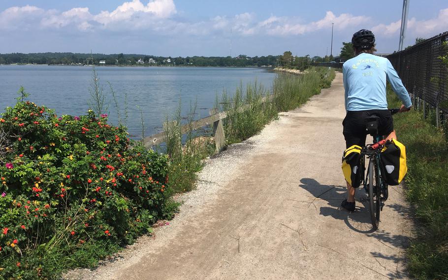 The author gets ready to push off his bike as he heads toward downtown Portland, Maine, from the Back Cove Trail.