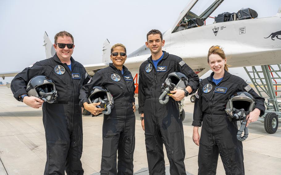 In this Aug. 8, 2021, photo provided by John Kraus, from left, Chris Sembroski, Sian Proctor, Jared Isaacman and Hayley Arceneaux stand for a photo in Bozeman, Mont., during a "fighter jet training" weekend to familiarize the crew with G-forces.