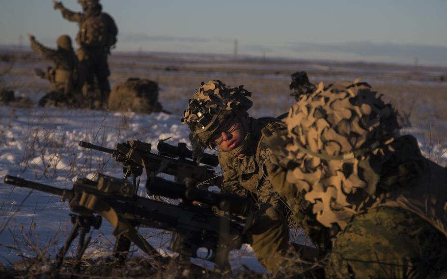 U.S. Marines from 1st Battalion, 4th Marine Regiment, 1st Marine Division, post security during Winter Fury 22 at Grant County Municipal Airport, Moses Lake, Wash., Jan. 31, 2022.
