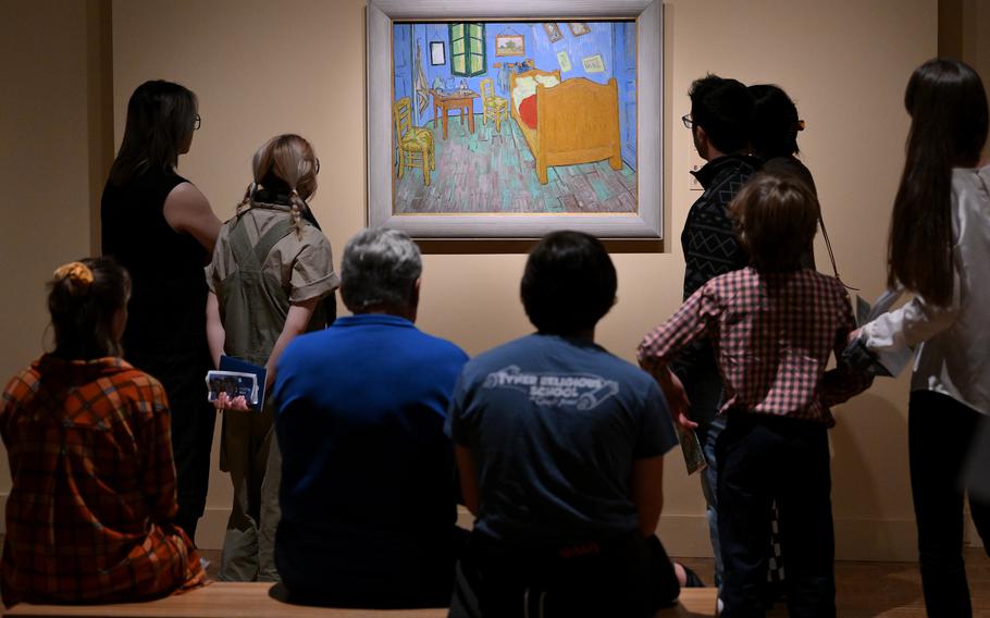 People look at “The Bedroom” at the Van Gogh exhibit at the Detroit Institute of Arts in Detroit on Oct. 2, 2022. 