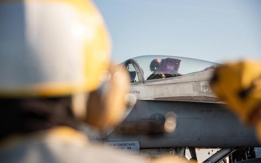 A pilot assigned to the "Raging Bulls" of Strike Fighter Squadron prepares to launch from USS Gerald R. Ford's flight deck on March 22, 2022, as the carrier earns its flight deck certification.