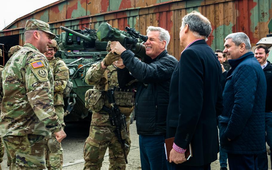 House Speaker Kevin McCarthy, R-Calif., holds a Carl Gustaf recoilless rifle during a congressional delegation visit to Mihail Kogalniceanu Air Base in Romania in April 2022. The delegation traveled to Romania to engage with U.S. and NATO forces in order to gain a better understanding of strategic efforts in Europe.