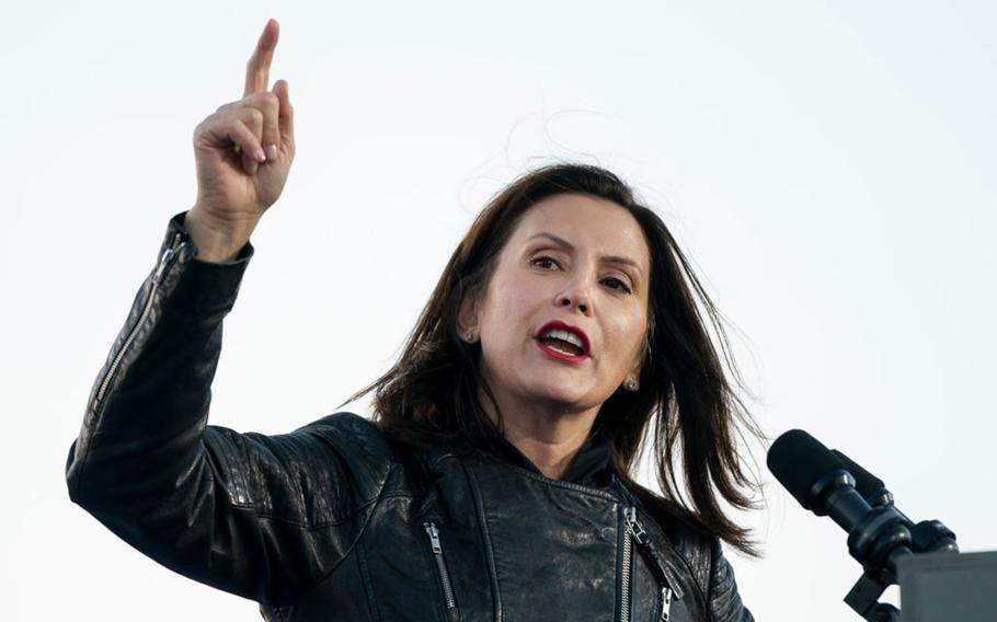 Michigan Gov. Gretchen Whitmer speaks during a drive-in campaign rally at Belle Isle on Oct. 31, 2020, in Detroit. 