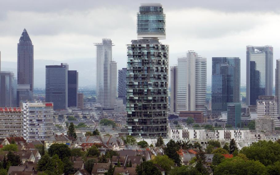 The Frankfurt skyline as seen from the Goetheturm, a sightseeing tower on the German city’s south side. In the center is the Neuer Henninger-Turm, a luxury apartment building with a restaurant on the top. It replaced the original tower, which was a grain silo and part of the Henninger brewery.