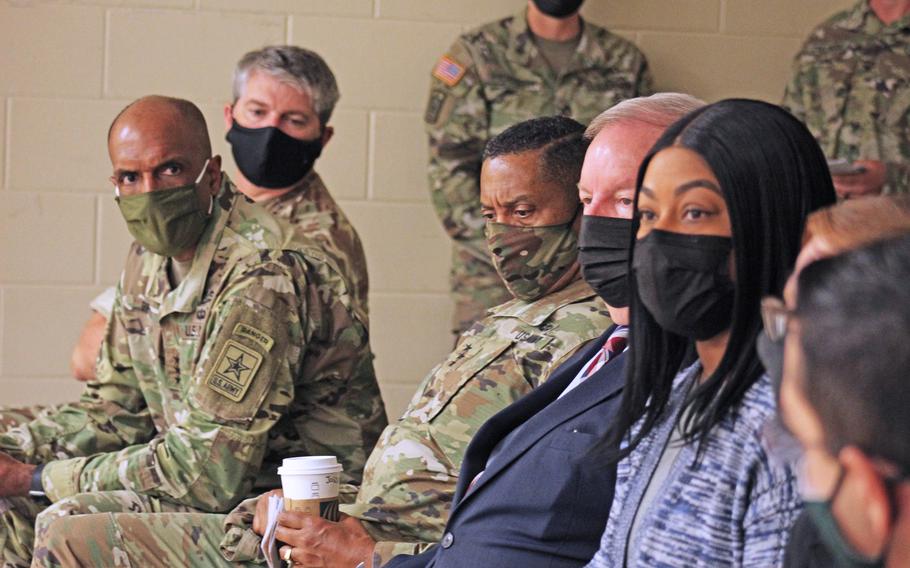 Maj. Gen. Michael Keating, deputy commander for support (U.K.) of III Corps and Fort Hood; Lt. Gen. Gary Brito, deputy chief of staff, G-1 of the U.S. Army; and Lt. Gen. Jason Evans, deputy chief of staff, G-9 of the U.S. Army, listen intently as Cpl. Elizabeth Allen-Perez provides some feedback following a sexual assault and suicide prevention demonstration at Fort Hood's new People First Center Oct. 7.  (U.S. Army photo by Brandy Cruz, Fort Hood Public Affairs)