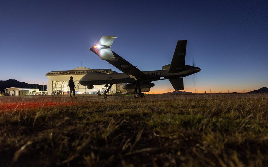 An MQ-9 Reaper drone with Customs and Border Protection returns from a mission over the U.S.-Mexico border on Nov. 4, 2022, at Fort Huachuca, Arizona.