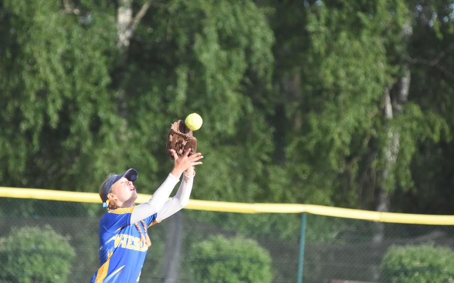 Wiesbaden shortstop Evelyn Traugutt catches a popup Thursday, May 22, 2025, at the DODEA-Europe Division I softball championships at Ramstein Air Base, Germany.