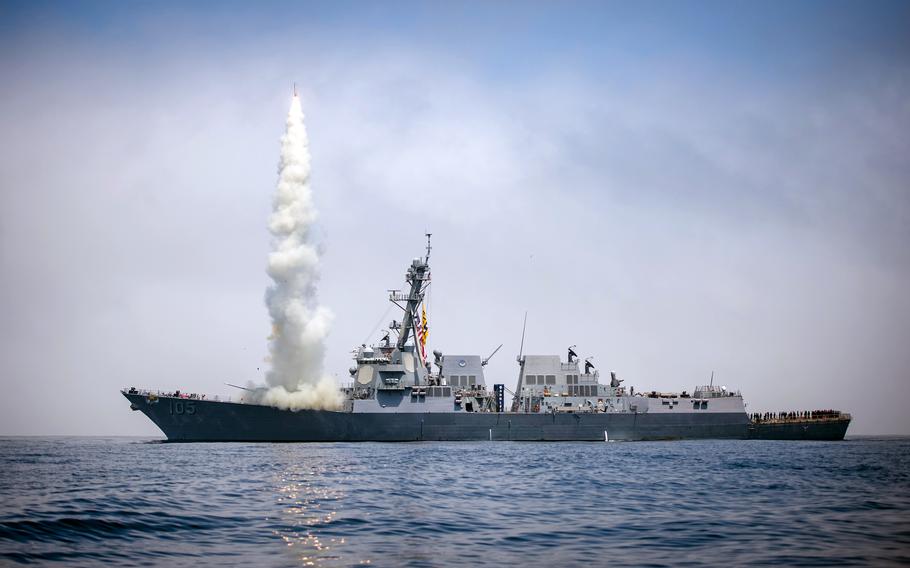 The guided-missile destroyer USS Dewey test-fires a Tomahawk missile somewhere in the Western Pacific, Aug. 17, 2018.