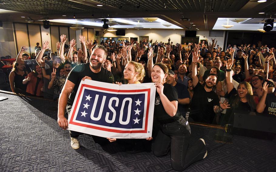 Comedians Hunter Hill, left, Iliza Shlesinger, center, and Laura Peek pose with fans after their performance at Yokota Air Base’s enlisted club in western Tokyo, July 20, 2023. 