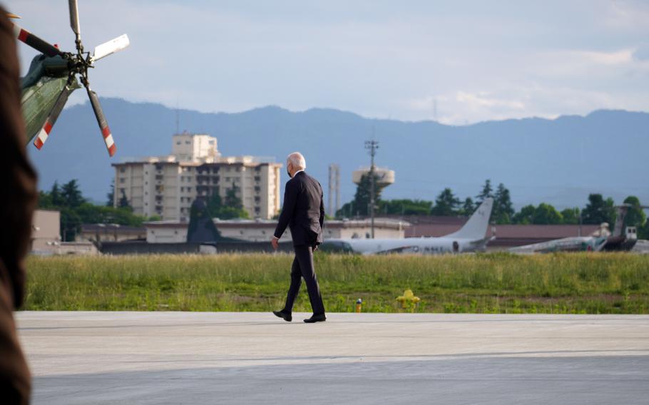 President Joe Biden walks toward Marine One at Yokota Air Base, Japan, Sunday, May 22, 2022. 