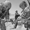 Hed: Washing of the feet, 2006

Ali Base, Iraq, April 2006 - Tech. Sgt. Jeffrey Fort, 33, of Florissant, Mo., an Air Force patrol leader, treats a local child for cuts on her feet during a recent patrol outside Ali Base in Iraq. 

META TAGS: Afghanistan; Operation Enduring Freedom; War on Terror; servicemembers; locals; Afghani; child; children; girl; kindness