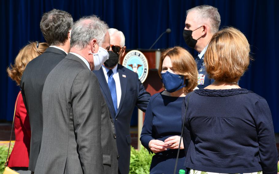 Deputy Secretary of Defense Kathleen Hicks speaks with Sen. Tim Kaine, D-Va., following the 9/11 observance ceremony for Pentagon employees on Sept. 10, 2021.