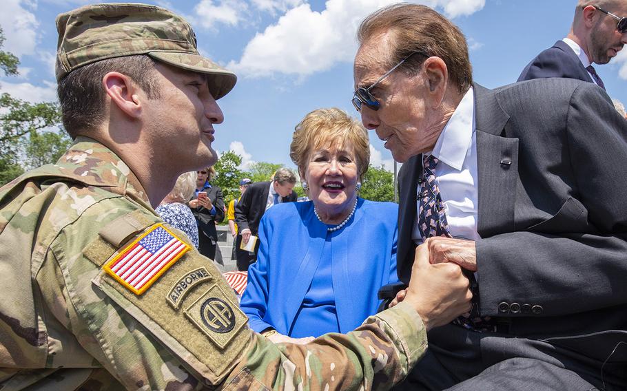 Former Sen. Bob Dole shakes hands with Lt. Col. Michael Lind with the Army’s G-1 office during Dole’s honorary promotion ceremony at the World War II Memorial in Washington, D.C., May 16, 2019. Dole, who was medically discharged as a captain after being severely wounded in WWII, was promoted to colonel.