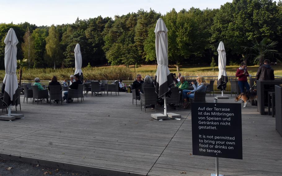 Some of the outdoor seating at the Seewooghutte in Ramstein-Miesenbach, Germany, overlooks the water. The kiosk reopened with expanded seating and a bigger menu last year. A playground was also built near the new kiosk.