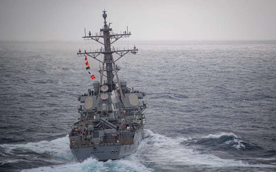 The Arleigh Burke-class, guided-missile destroyer USS Decatur steams in the South China Sea on Jan. 28, 2023.  