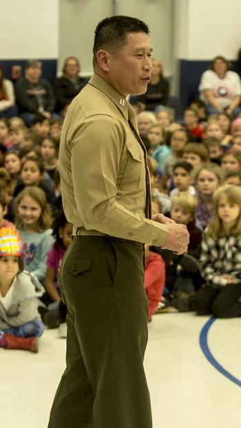 Marine Capt. Grady Kurpasi in January 2019 speaking to elementary school students in North Carolina when he served as commanding officer of the Headquarters Company of the 2nd Marine Regiment.